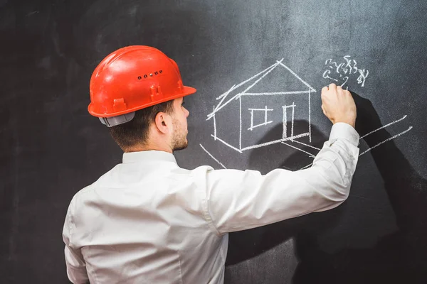 Baumeister bemalt Haus auf Kreide — Stockfoto