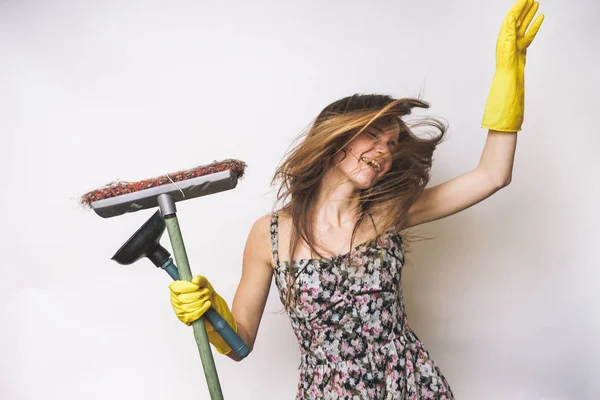 Happy Spring Cleaning lady dancing on white — Stock Photo, Image