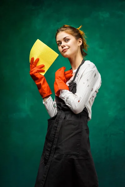 A girl in special clothes smiles and is going to do cleaning — Stock Photo, Image