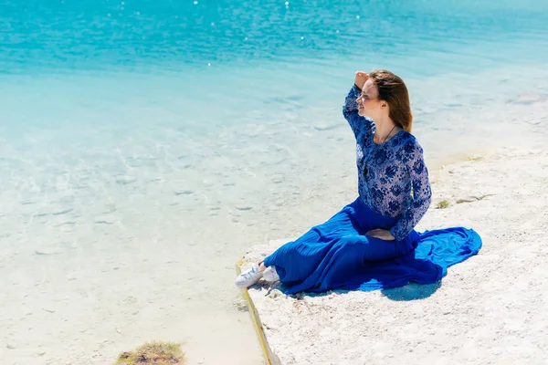 Freedom woman in free happiness bliss on beach. Smiling happy multicultural female model in summer dress enjoying serene ocean nature during travel holidays vacation outdoors,sitting.Dental. — Stock Photo, Image