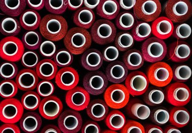 bir avuç Kraliçe konu. Dikiş ipliği kırmızı tonları. güzel arka plan