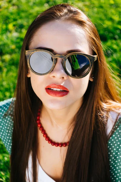 Close up woman face in sunglasses,wooden glasses,whitening — Stock Photo, Image