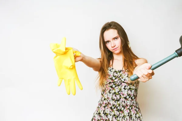 Lady gives plunger and gloves,cleaning,holds rubber gloves — Stock Photo, Image