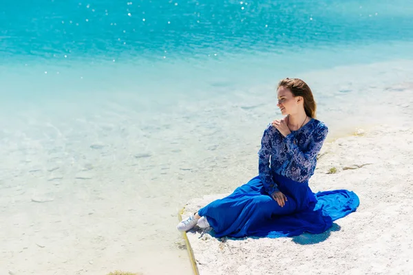 Freedom woman in free happiness bliss on beach. Smiling happy multicultural female model in summer dress enjoying serene ocean nature during travel holidays vacation outdoors,sitting.Dental. — Stock Photo, Image