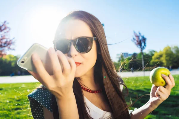 Furious woman with mobile screaming,bad,negative angry concept