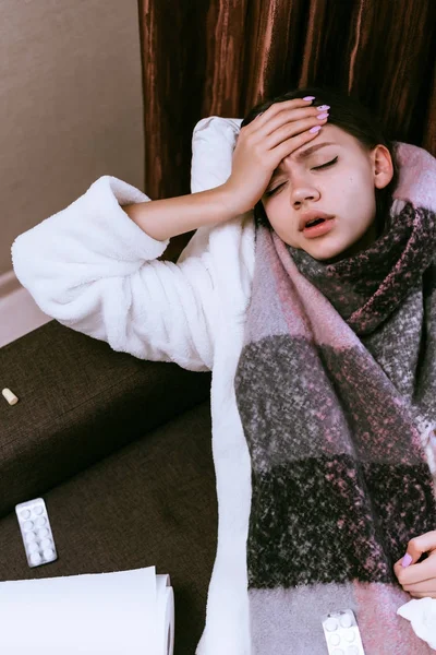 Young girl is very sick, high temperature, round neck warm scarf — Stock Photo, Image