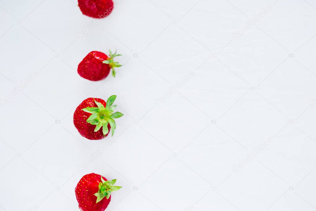 Fresh raw healthy diet strawberries fruit in plate,isolated on white,view above,flatlay close-up,copyspace for text,frame