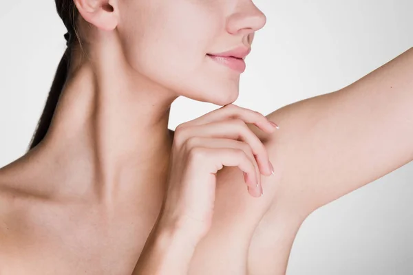 Young cute girl showing armpits without hair — Stock Photo, Image