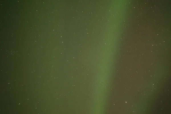 Northern lights ,Aurora borealis,green,purple,blue,stars .North Pole,Iceland,Russia — Stock Photo, Image