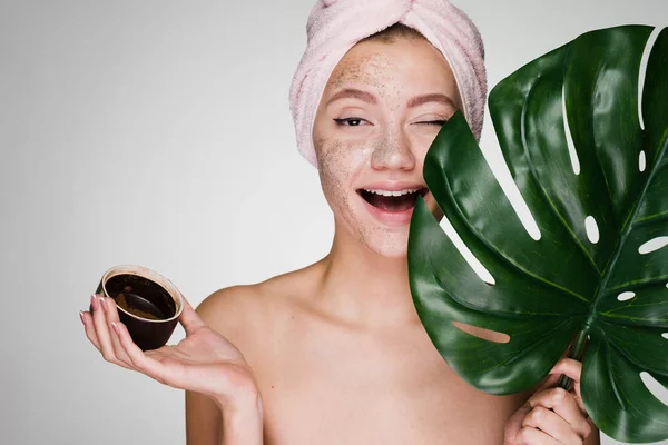 Happy woman has applied a scrub to the skin after a shower — Stock Photo, Image