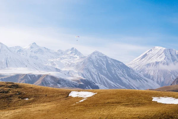 High mountains covered with white snow, fields — Stock Photo, Image