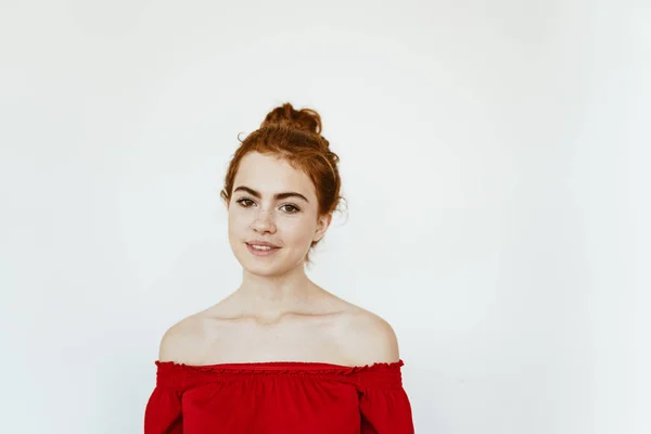 Student in a red blouse with a strict haircut — Stock Photo, Image