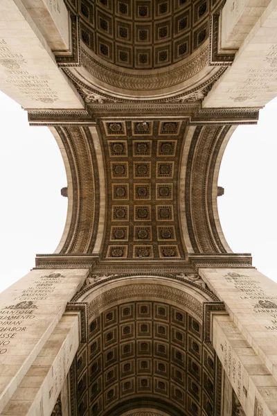 stock image Paris. Triumphal arch, view from below.