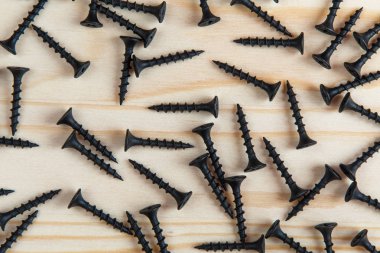 Arka plan. Hafif ahşap arka plan üzerinde siyah donanım