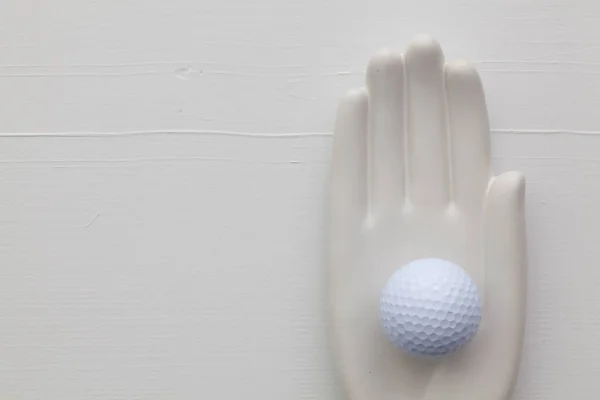 Detalj av artificiell hand med golf utrustning — Stockfoto