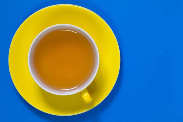 Perfect cup of tea on blue wooden table — Stock Photo, Image