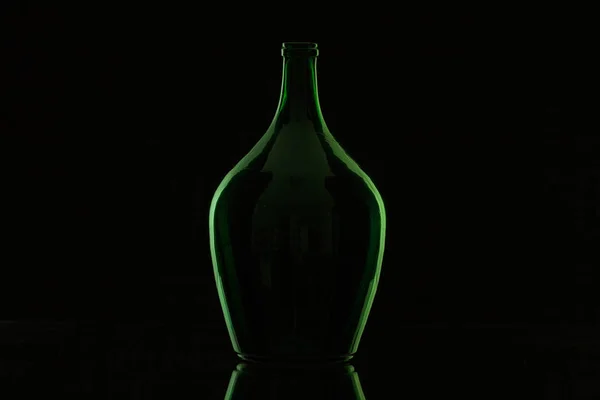 Silhouette of elegant and very old wine bottle — Stock Photo, Image