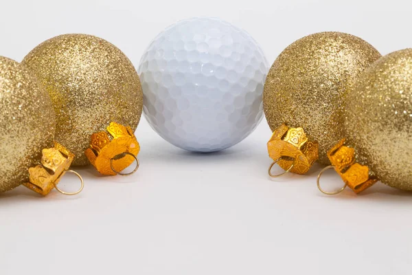 Golfboll och juldekoration — Stockfoto