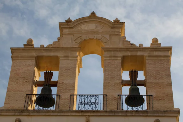 Klockor på Sevillas katedral i solnedgången. Spanien. — Stockfoto