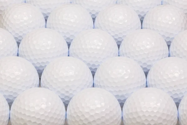 Muster aus weißen Golfbällen — Stockfoto