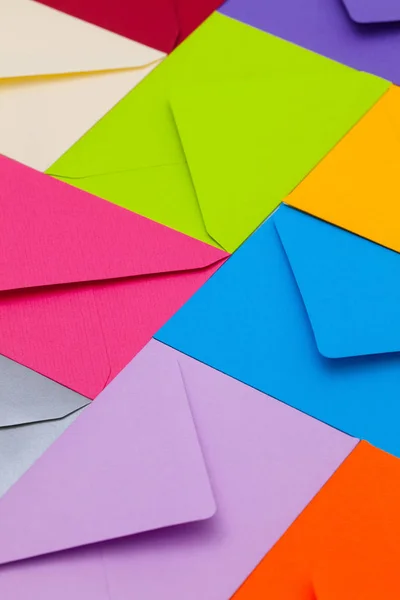 Different colored envelopes on the desk — Stock Photo, Image