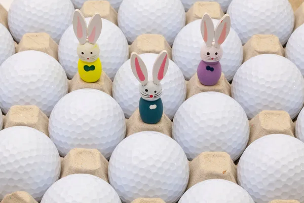 Golf balls in the box for eggs and Easter decoration — Stock Photo, Image