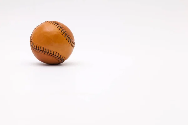 Leather baseball ball on the white desk — Stock Photo, Image