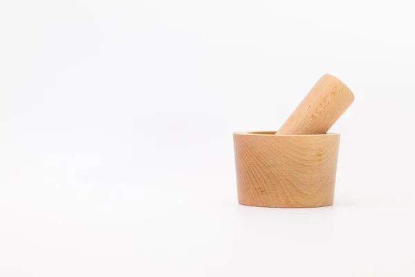 Mortier en bois tropical sur bureau blanc — Photo