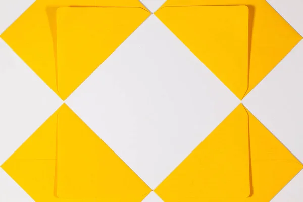 Yellow envelopes on the white table — Stock Photo, Image