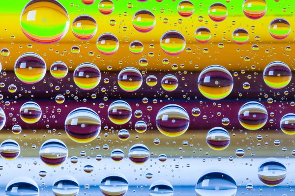 Fondo abstracto con gotas y lápices de madera —  Fotos de Stock