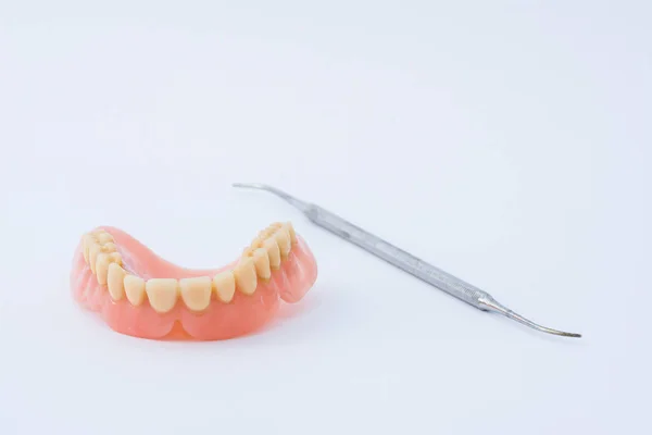 Dental prosthesis and instrumental — Stock Photo, Image