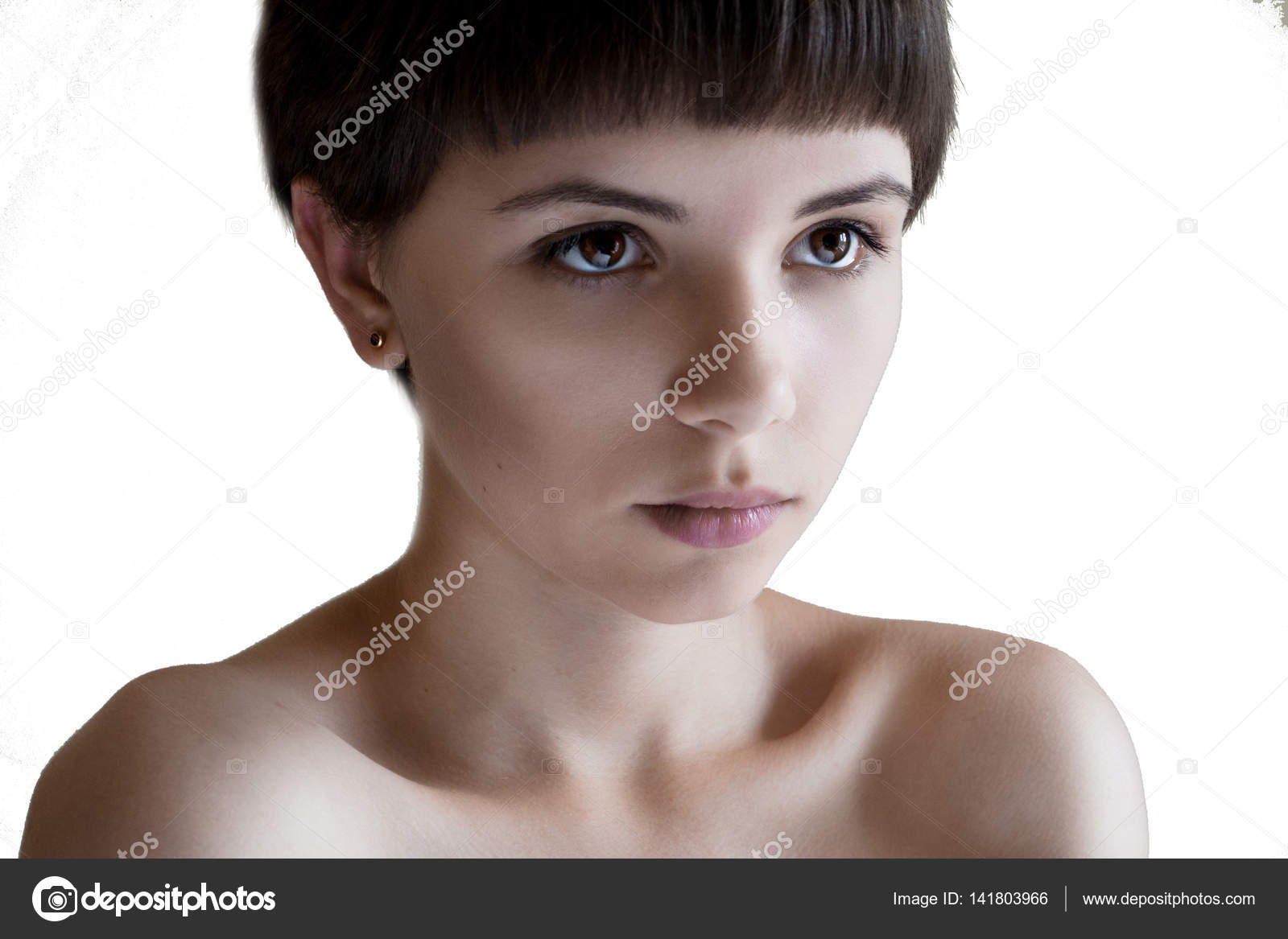 Portrait Of A Beautiful Girl With Short Hair Brown Eyes And Bare
