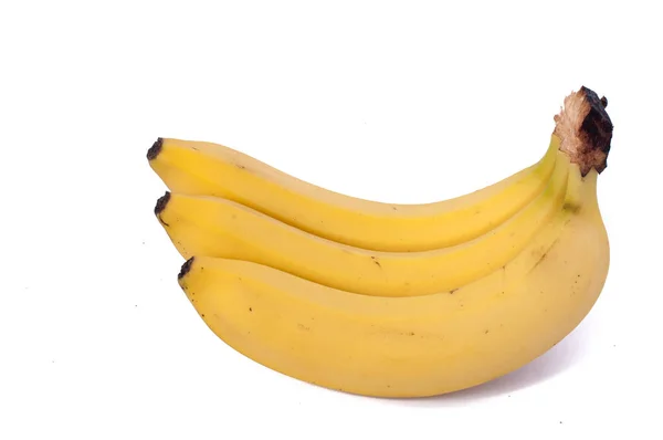 Trzy banany izolowane na białym tle — Zdjęcie stockowe