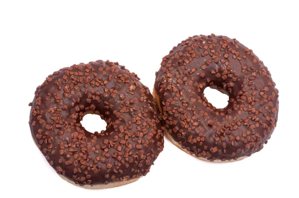 İki çikolatalı donuts ile sprinkles. Beyaz bir arka plan üzerinde izole