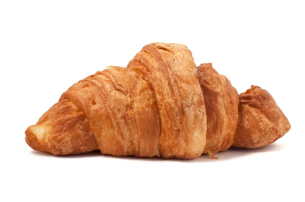 Croissant fresco e gustoso su sfondo bianco isolato — Foto Stock