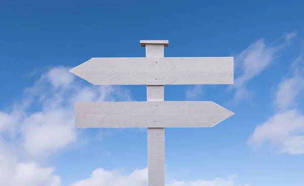 Wood signpost against blue sky, decision or choice concept