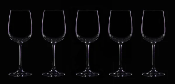 Silhouette of wineglass with violet illumination — Stock Photo, Image