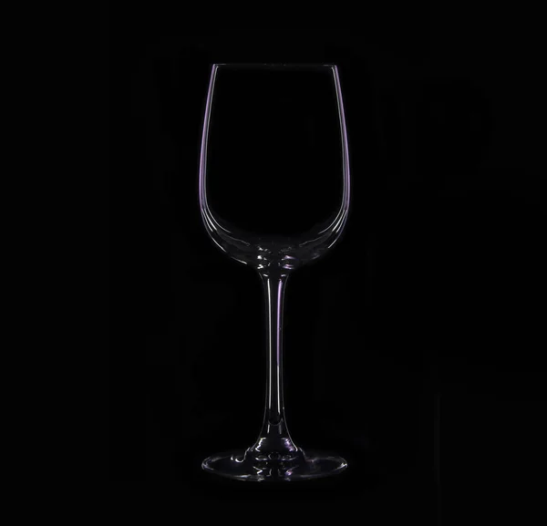 Silhouette of wineglass with violet illumination — Stock Photo, Image