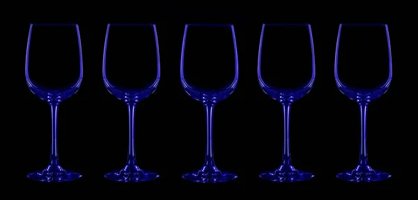 Silhouette of wineglass with blue and red illumination — Stock Photo, Image