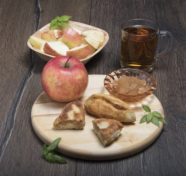 Apple theme. Apple juice, jam, pies with jam — Stock Photo, Image