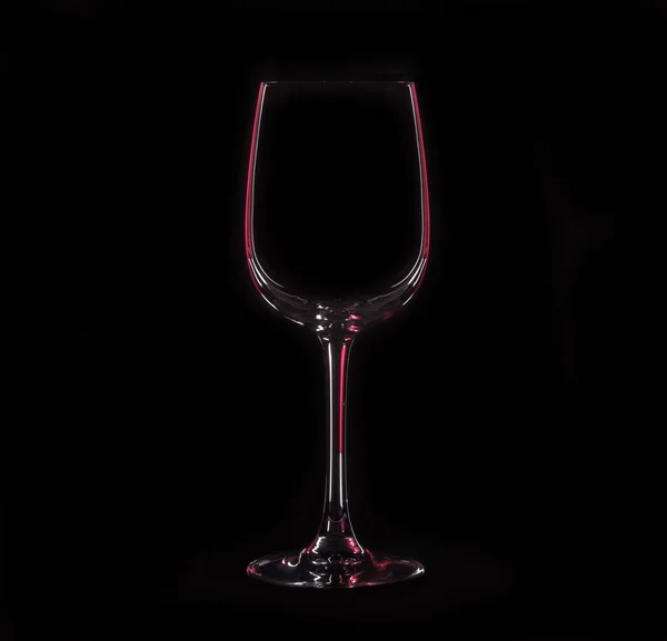 Silhouette of wineglass with red illumination — Stock Photo, Image