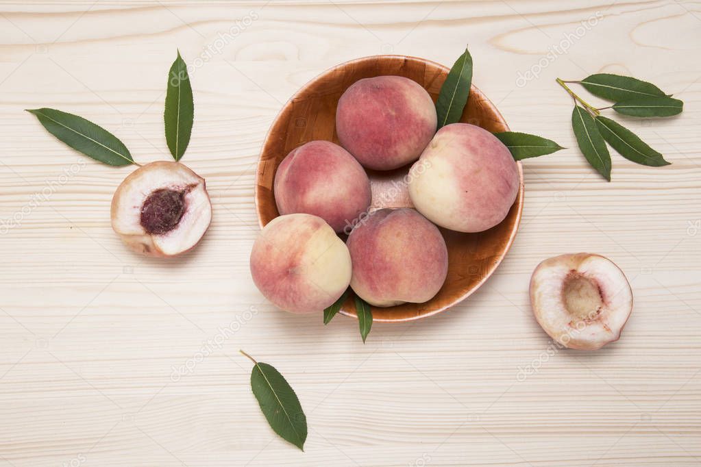 Peaches on a wooden table