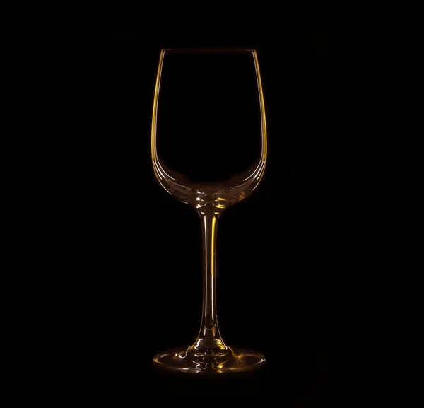 Silhouette des Weinglases mit gelber und brauner Beleuchtung — Stockfoto