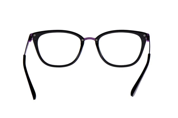 Óculos em uma moldura metálica violeta isolada em um fundo branco . — Fotografia de Stock