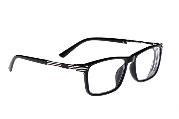 Óculos em uma moldura de plástico preto isolado em um fundo branco . — Fotografia de Stock