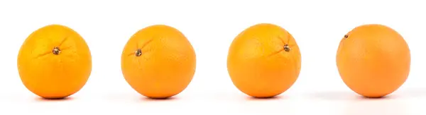 Свежие оранжевые фрукты на белом фоне. — стоковое фото
