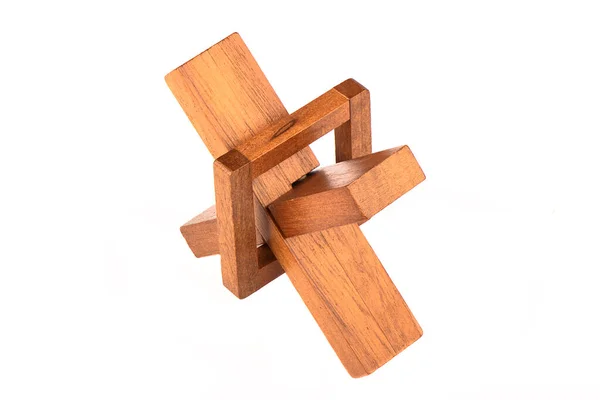 Assembled wooden cross puzzle isolated on a white background. — Stock Photo, Image
