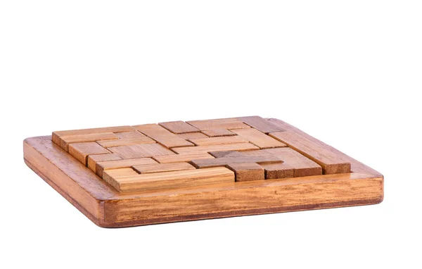 Trojrozměrné dřevěné pentamino desková hra na bílém pozadí. — Stock fotografie