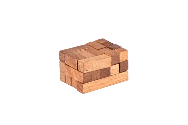 Assembled three-dimensional wooden pentamino board game on a white background. — Stock Photo, Image