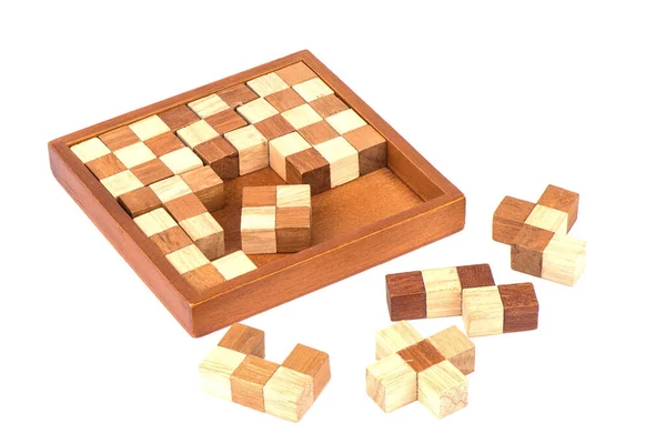 Houten polymino puzzel geïsoleerd op een witte achtergrond. — Stockfoto